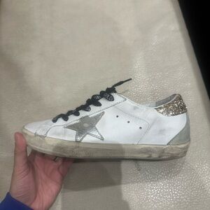 Golden Goose White and Gold Sneakers with Vintage Style